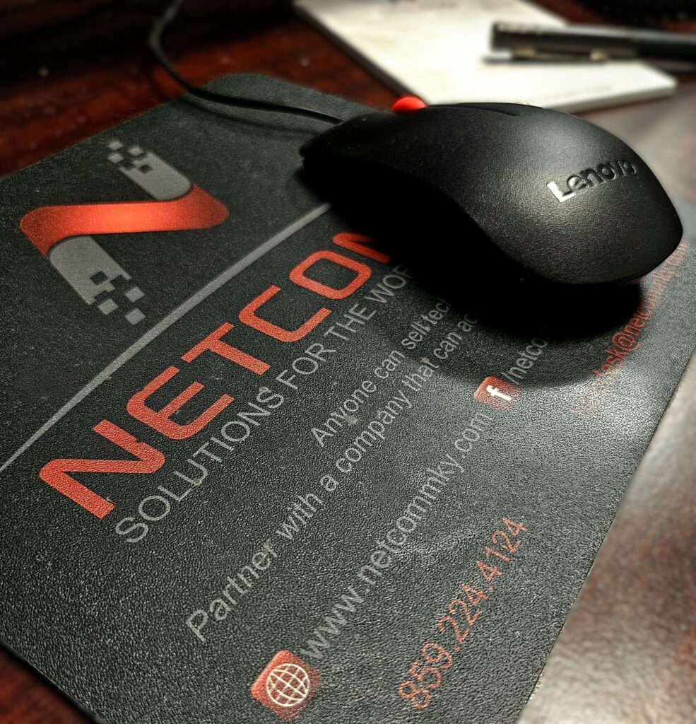 Lenovo mouse on Netcomm mousepad, searching IT Trends and AI tools